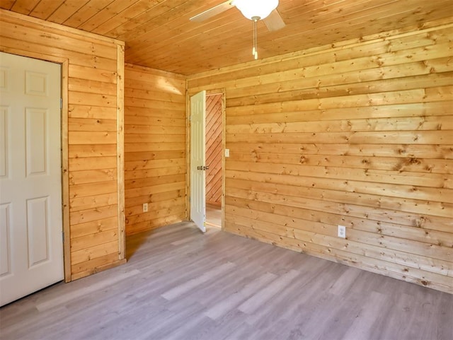 bonus room featuring wood walls, wood-type flooring, and wood ceiling