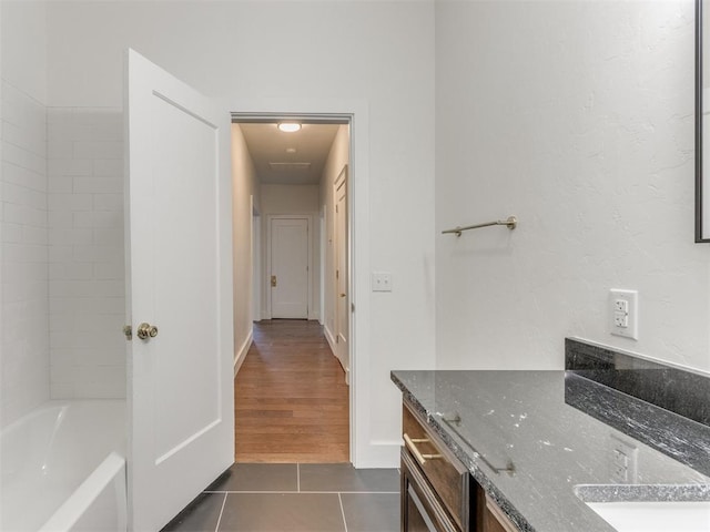 bathroom with vanity and wood-type flooring