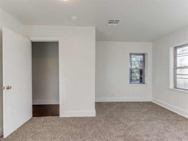 unfurnished bedroom featuring carpet flooring