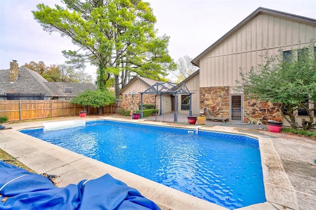 view of pool featuring a patio area