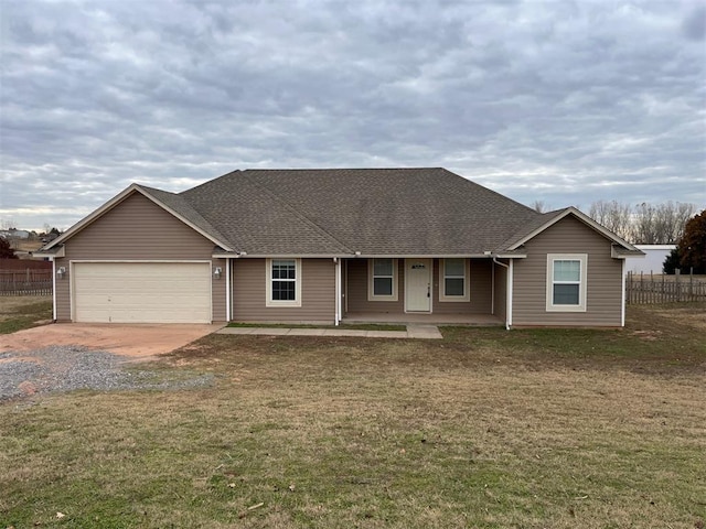 single story home featuring a front lawn, a porch, and a garage