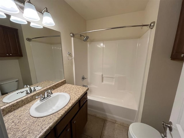 full bathroom with tile patterned flooring, vanity, toilet, and  shower combination