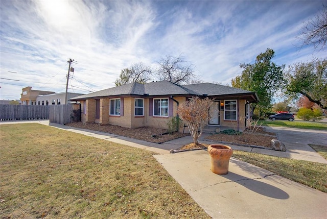 view of front of property with a front lawn