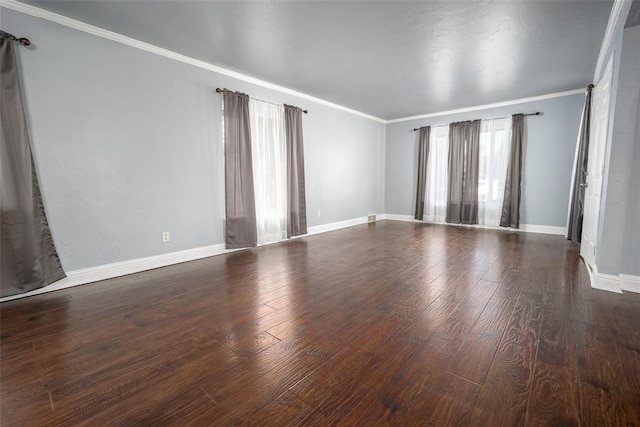 unfurnished room featuring crown molding and dark hardwood / wood-style floors