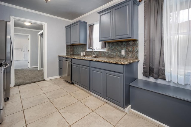 kitchen with appliances with stainless steel finishes, gray cabinetry, crown molding, sink, and light tile patterned flooring