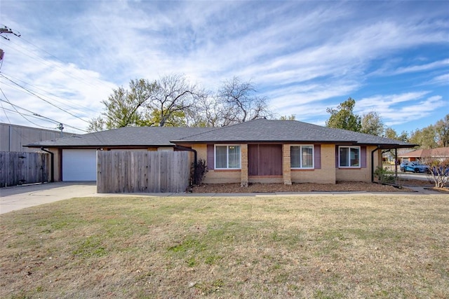 2100 Barclay Rd, Oklahoma City, OK 73120 - ranch-style home featuring driveway, brick siding, and an attached garage