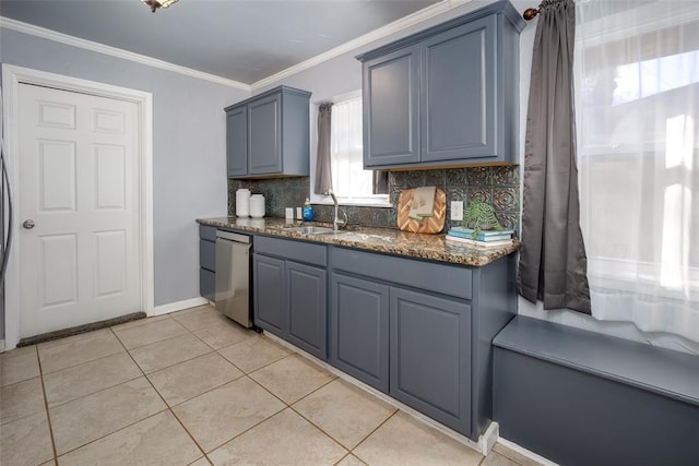 2100 Barclay Rd, Oklahoma City, OK 73120 - kitchen featuring dishwasher, a sink, decorative backsplash, dark stone counters, and light tile patterned floors