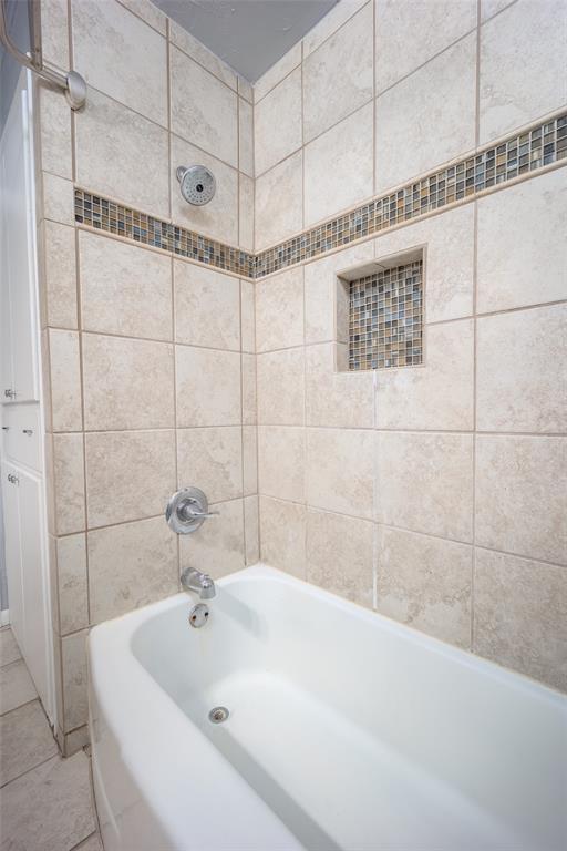 2100 Barclay Rd, Oklahoma City, OK 73120 - bathroom with shower / tub combination and tile patterned floors