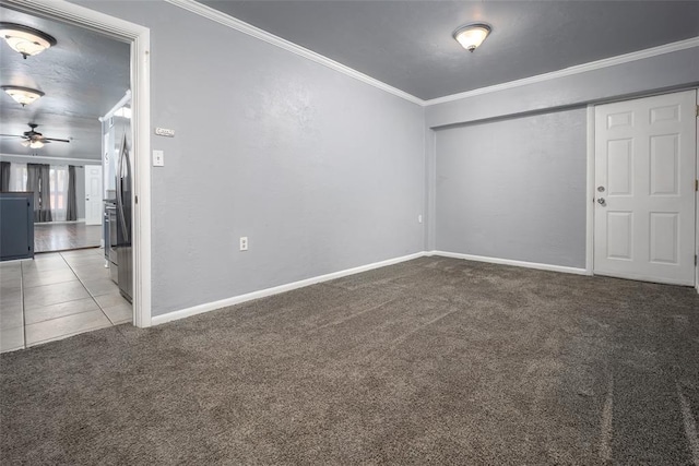 2100 Barclay Rd, Oklahoma City, OK 73120 - carpeted spare room featuring ornamental molding, ceiling fan, and baseboards