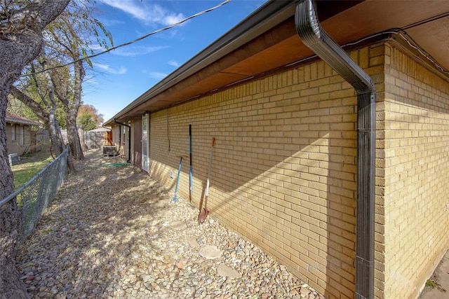 2100 Barclay Rd, Oklahoma City, OK 73120 - view of home's exterior featuring fence and brick siding
