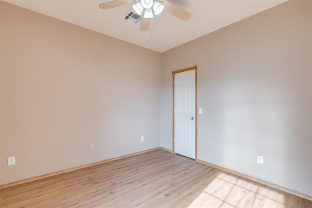 unfurnished room with ceiling fan and light hardwood / wood-style flooring