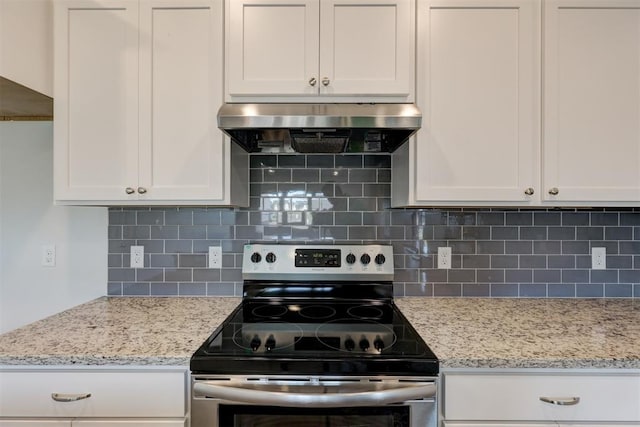 kitchen with white cabinets, stainless steel electric range oven, backsplash, and extractor fan