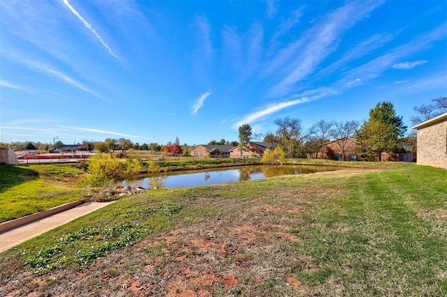 view of yard with a water view