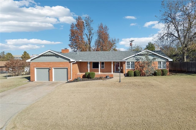 ranch-style home with a garage and a front lawn