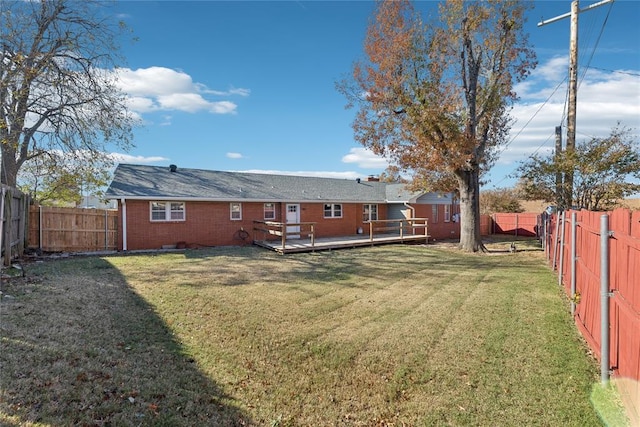 view of yard with a wooden deck