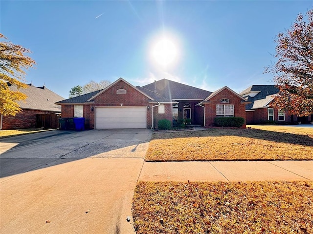 single story home featuring a garage