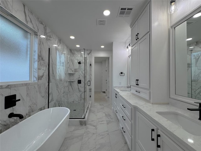 bathroom featuring vanity and plus walk in shower