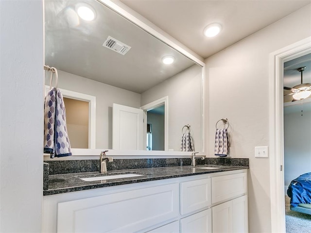 bathroom with vanity and ceiling fan