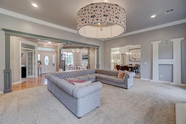 living room with carpet flooring and crown molding