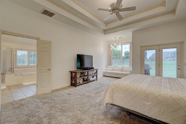 tiled bedroom with ceiling fan with notable chandelier, access to outside, a raised ceiling, and ornamental molding