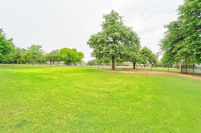 view of yard with a rural view