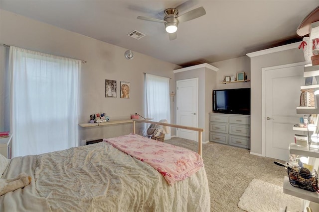 carpeted bedroom featuring ceiling fan