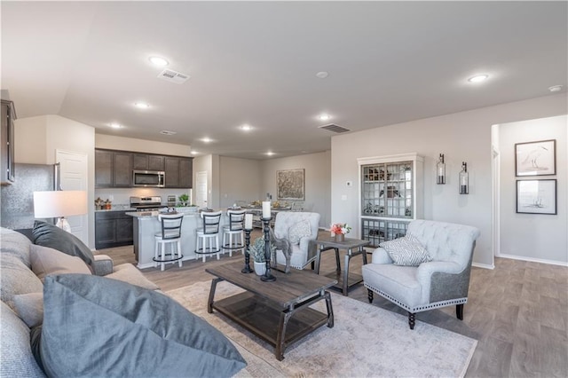 living room with light wood-type flooring