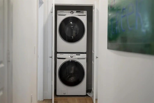 washroom with stacked washer and clothes dryer