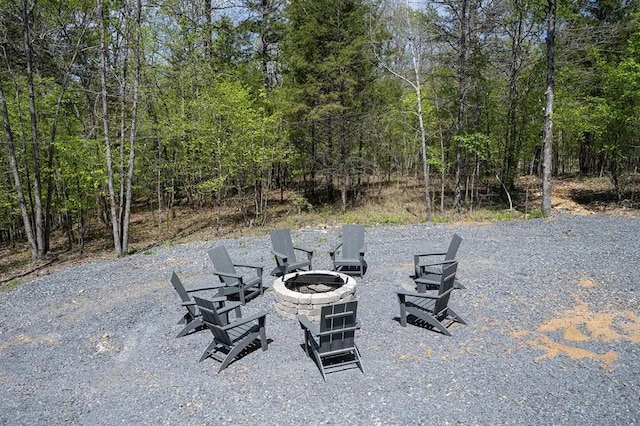 view of patio / terrace with an outdoor fire pit