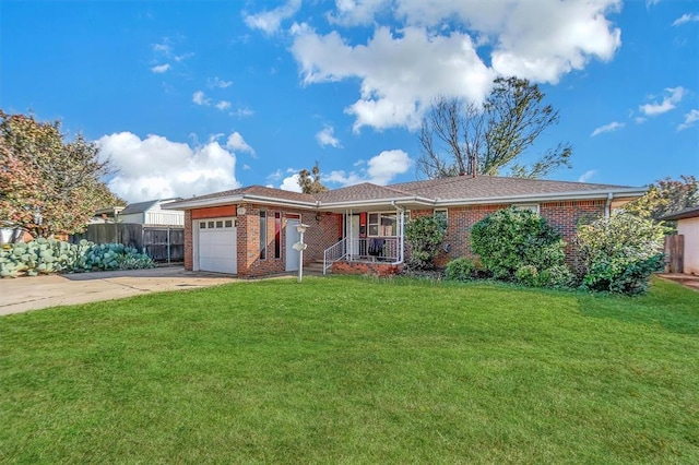 ranch-style house with covered porch, a garage, and a front lawn