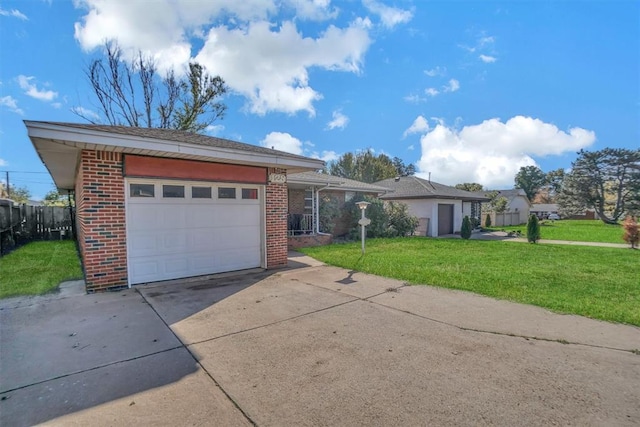 single story home with a front yard and a garage