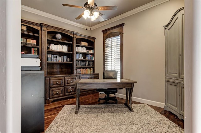 office space with ceiling fan, ornamental molding, and dark wood-type flooring