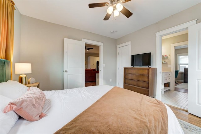 bedroom featuring wood-type flooring and ceiling fan