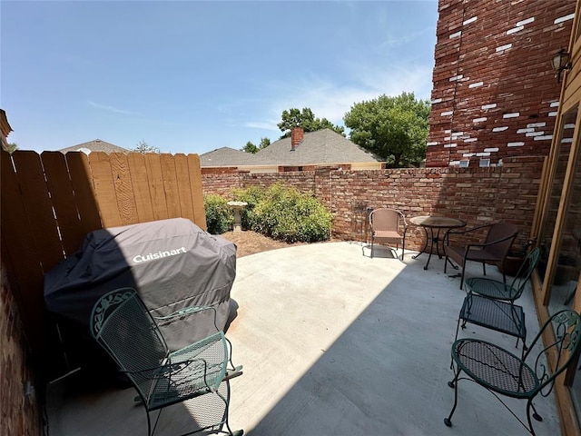 view of patio / terrace featuring a grill