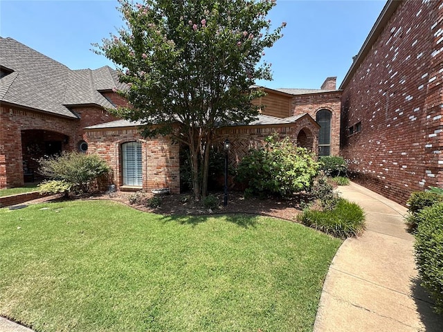 exterior space featuring a lawn