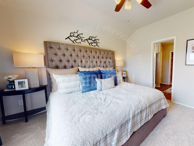 bedroom with carpet flooring, ceiling fan, and lofted ceiling