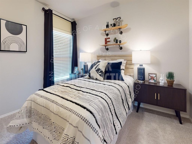 bedroom with light colored carpet