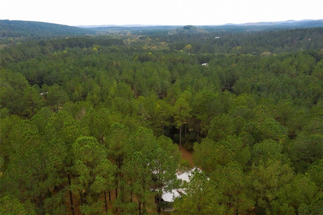 aerial view with a wooded view
