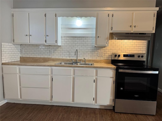 kitchen with stainless steel range with electric cooktop, white cabinets, sink, dark hardwood / wood-style floors, and tasteful backsplash