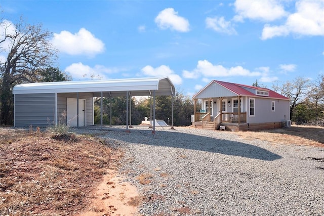 exterior space with a carport