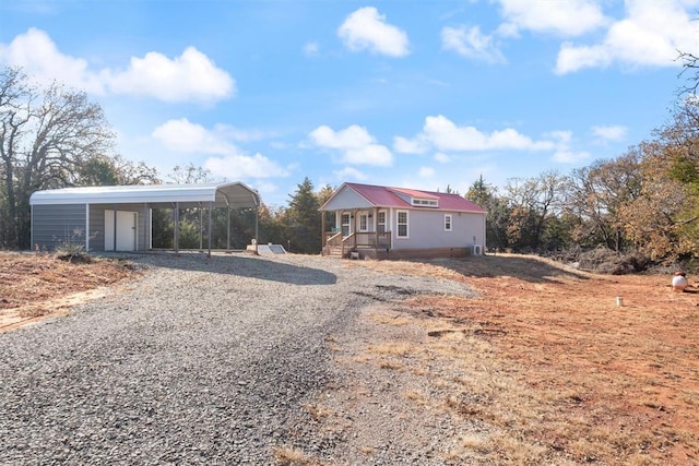 view of front of property with a carport