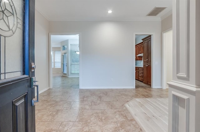 foyer entrance with ornamental molding