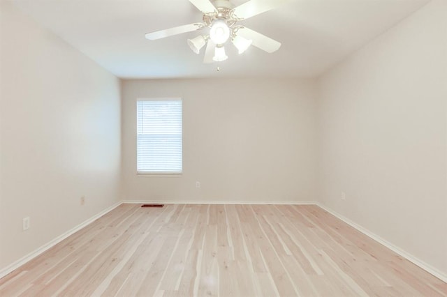 unfurnished room with ceiling fan and light hardwood / wood-style floors