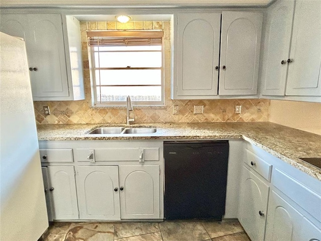 kitchen featuring dishwasher, tasteful backsplash, white cabinetry, and sink