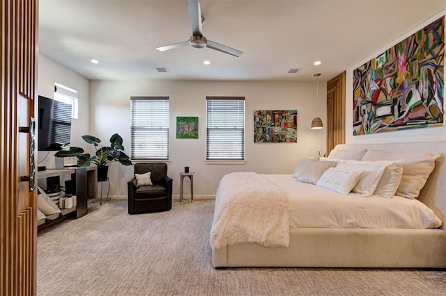 carpeted bedroom with ceiling fan