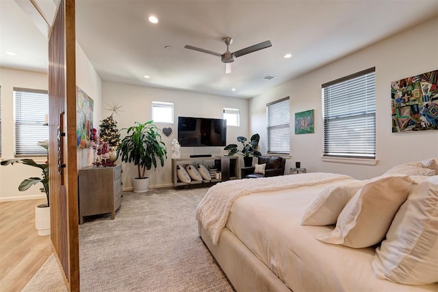 bedroom featuring ceiling fan and light wood-type flooring