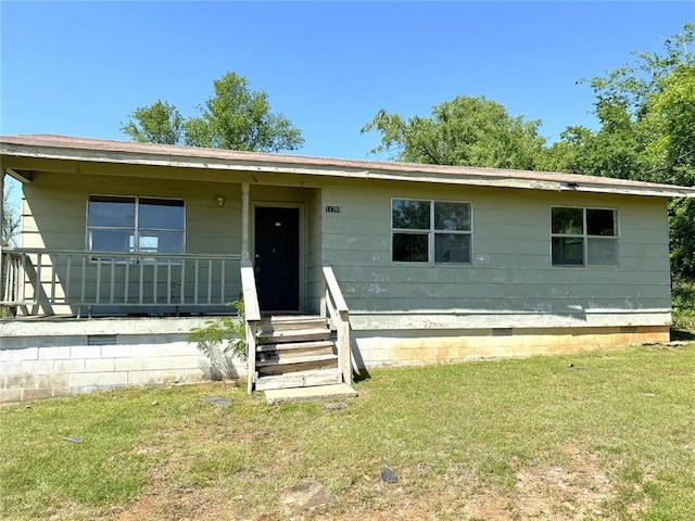 ranch-style home featuring crawl space and a front yard