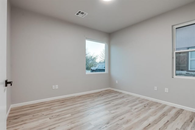 empty room featuring light wood-type flooring