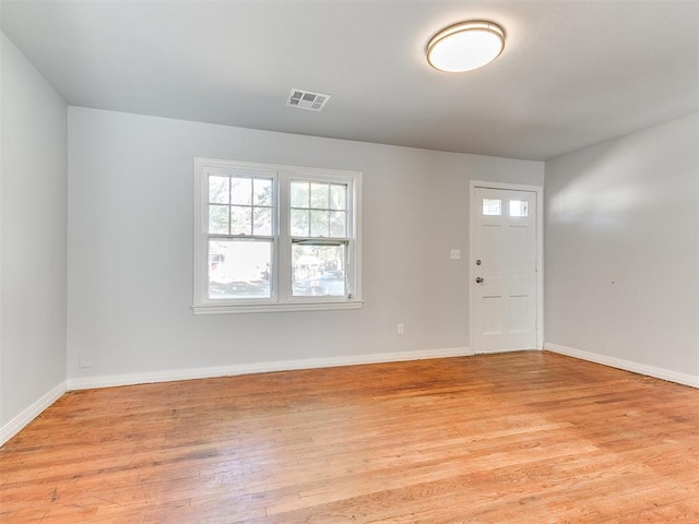 foyer with light wood-type flooring