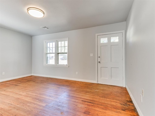 foyer with light hardwood / wood-style flooring